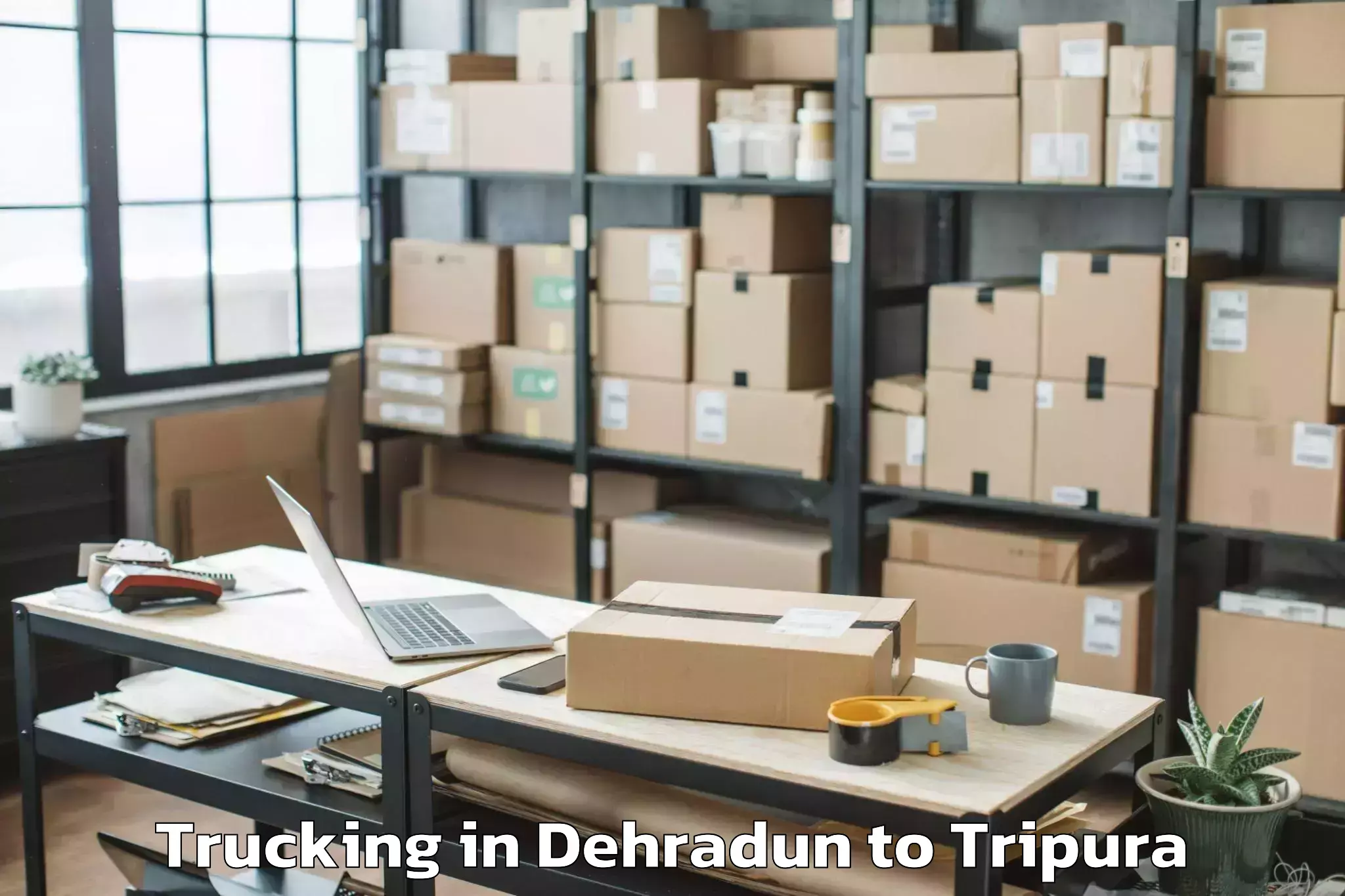 Book Your Dehradun to Manughat Trucking Today